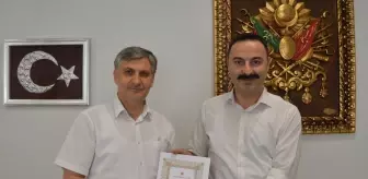 Kaymakam Mustafa Ayvat'a TDV'den Teşekkür Belgesi