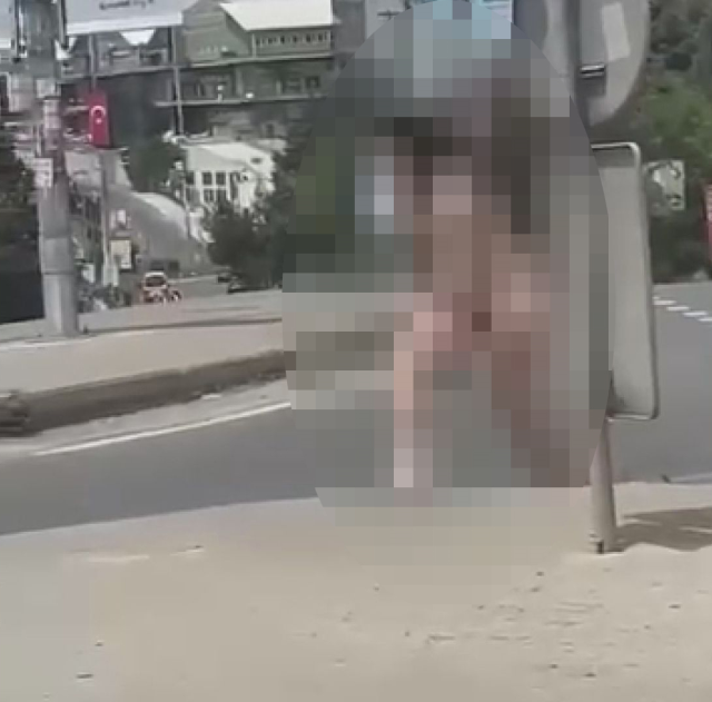 A Woman Walking Naked in Başakşehir Captured on Camera