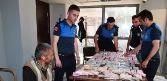 Dilencinin üzerinden çıkan parayı 4 zabıta sayabildi