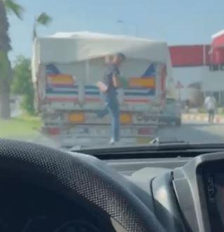Stole watermelon from a truck stopped at a red light