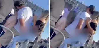 Konserde kız arkadaşına sarılırken arkasındaki kadını taciz etti