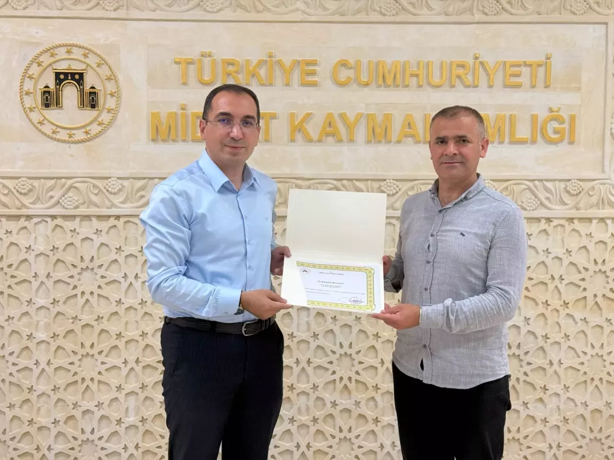 Midyat Kaymakamı'ndan DHA Muhabirine Teşekkür Belgesi