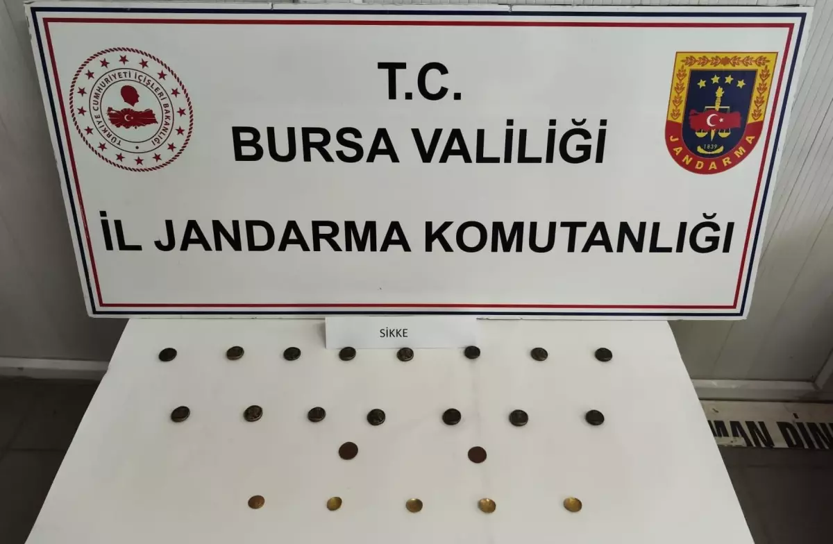 İnegöl'de Tarihi Eser Kaçakçılığı Operasyonu: 22 Sikke Ele Geçirildi