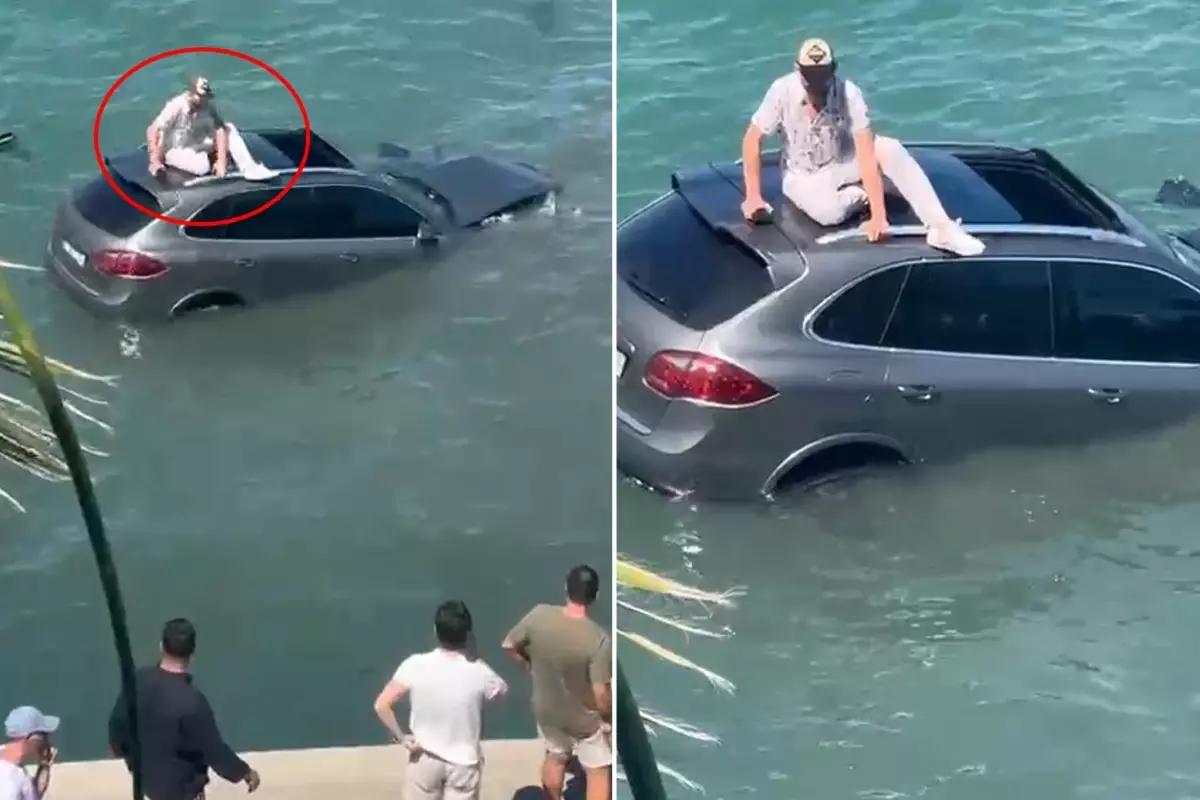 Denize uçan lüks cipin üzerinde dakikalarca kurtarılmayı bekledi