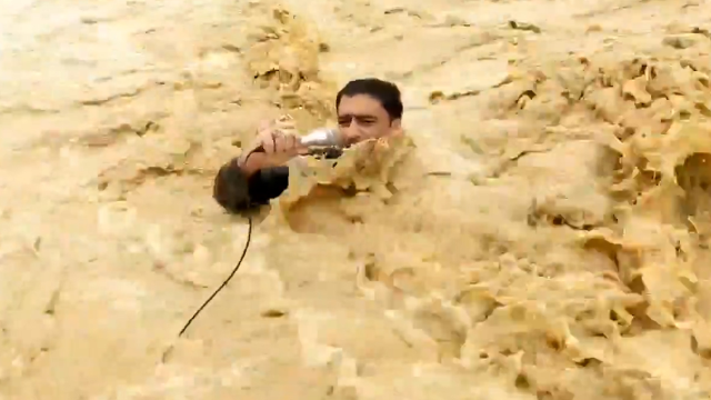The reporter broadcasting in the floodwaters was swept away by the current