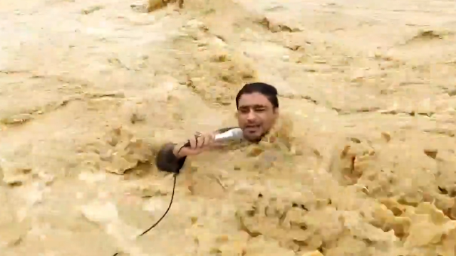 The reporter broadcasting in the floodwaters was swept away by the current