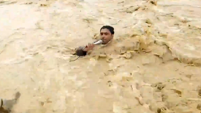The reporter broadcasting in the floodwaters was swept away by the current