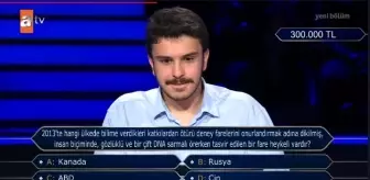 2013'te hangi ülkede bilime verdikleri katkılardan ötürü deney farelerini onurlandırmak adına dikilmiş, insan biçiminde, gözlüklü ve bir çift DNA..