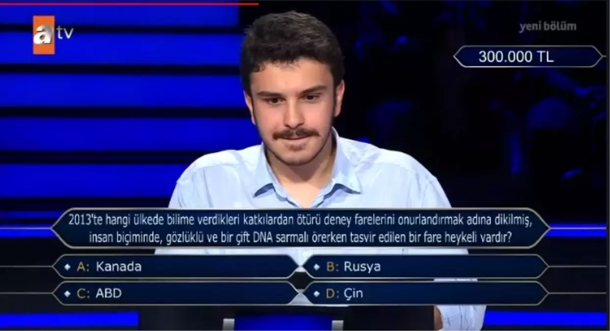 2013'te hangi ülkede bilime verdikleri katkılardan ötürü deney farelerini onurlandırmak adına dikilmiş, insan biçiminde, gözlüklü ve bir çift DNA..