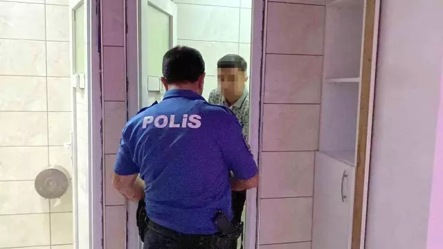 He hid in the bathroom when he saw the relatives of the woman he harassed by phone