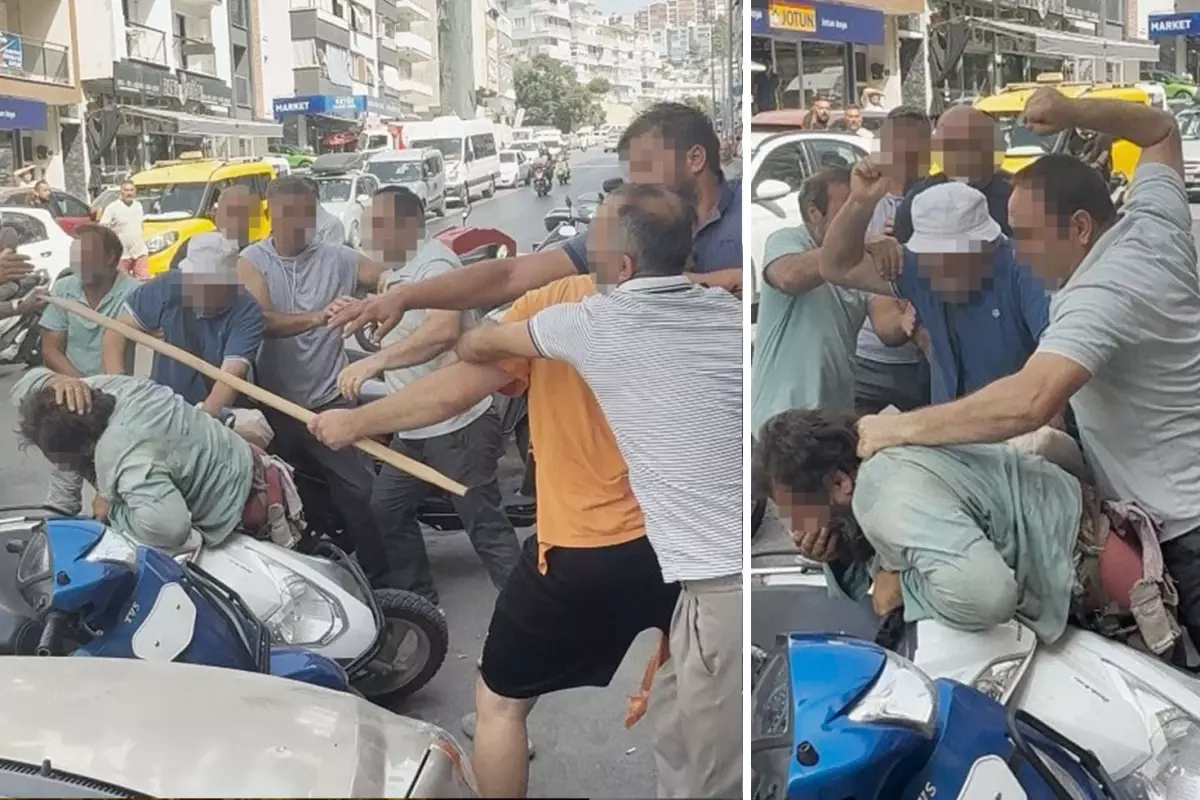 Yol ortasında yumruk ve sopalarla öldüresiye dövdüler