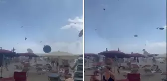 Hortum, plajı savaş alanına çevirdi: Turist canını zor kurtardı