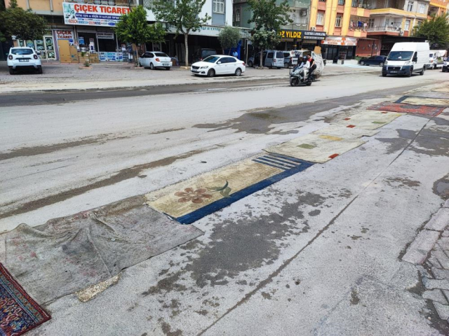 belediyenin yapmadigi yola esnaftan ilginc cozum 18922790 591 m