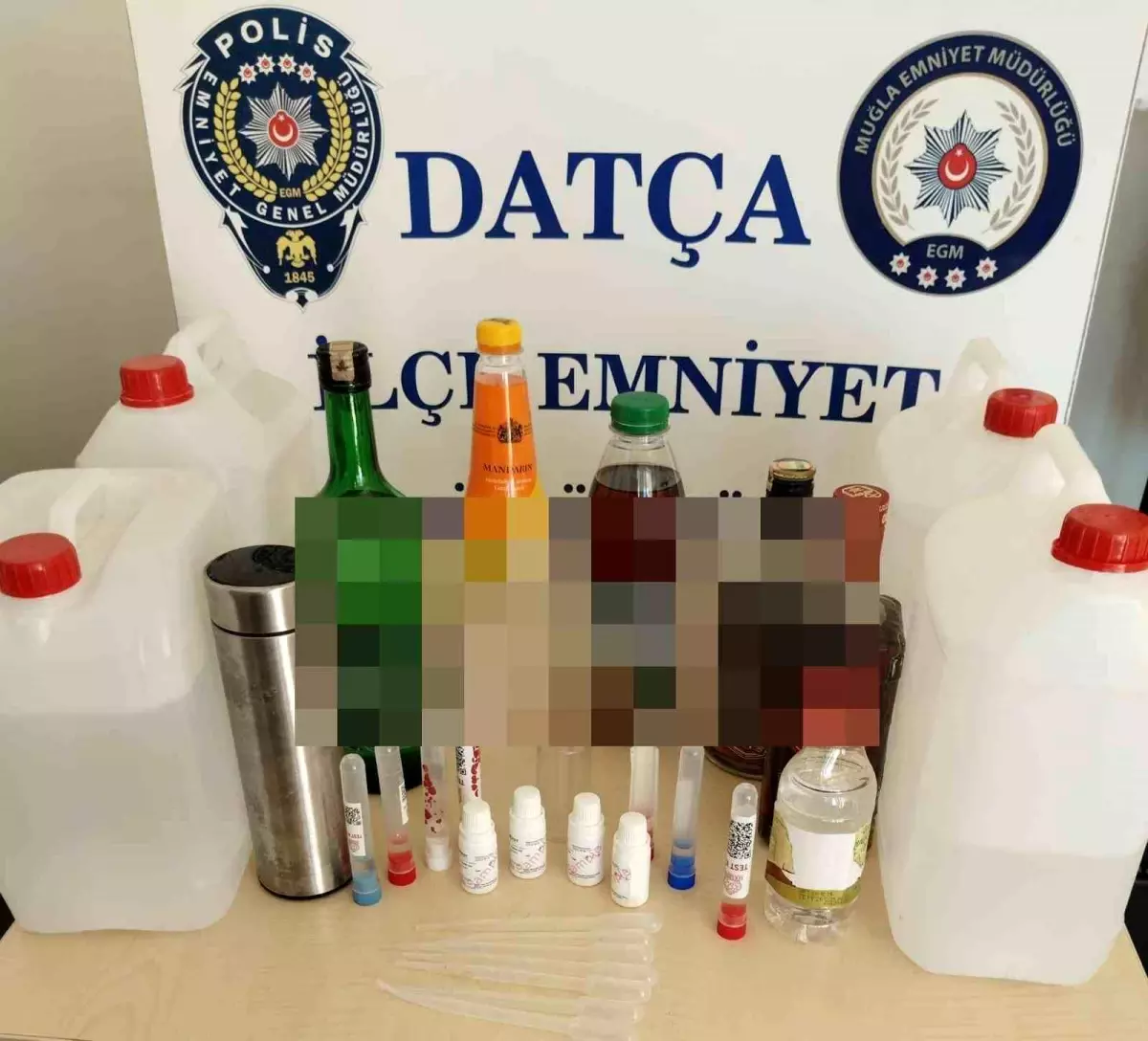 Datça&apos;da Kaçak Alkol Operasyonu: Çok Sayıda Malzeme Ele Geçirildi