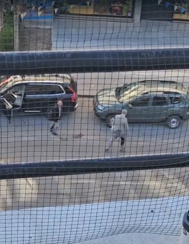 Moments when the businessman was shot in the middle of the street are on camera