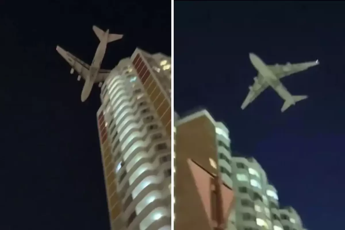 Dünyanın en büyük kargo uçağı droneden kaçarken az daha binalara çarpıyordu