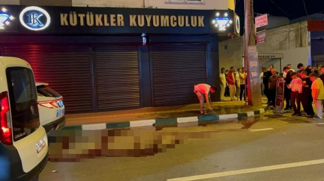 He entered the crowd with a shotgun and shot his rival in the head