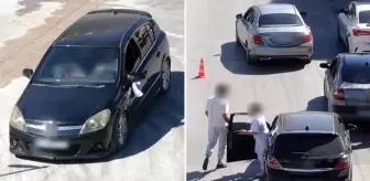 Ehliyetsiz sürücü eşiyle yer değiştirdi, drondan kaçamadı