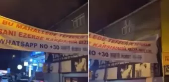 Mahalleyi karıştıran pankart! Telefon kodu dikkatlerden kaçmadı