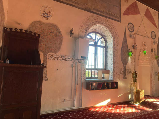 A natural gas boiler was installed on the wall of the 139-year-old mosque facing the qibla