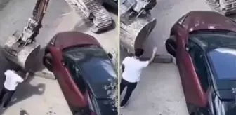 İş makinesi ile araç çekmeye kalktılar, ellerine yüzlerine bulaştırdılar