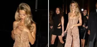 Ünlü model, altına iç çamaşırı giymediği elbisesi ile frikik verdi