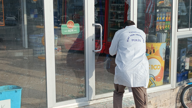 He broke the market's window with a stone and enjoyed eating and drinking inside