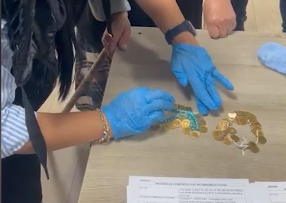 The beggar was found with shiny gold coins! The zoning team couldn't count them all