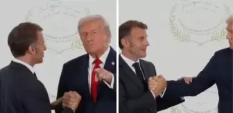 Zirveye damga vuracak görüntüler! Trump ile Macron bilek güreşine tutuştu