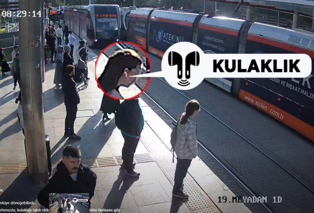The security officer saved her from being under the tram; those moments were captured on camera