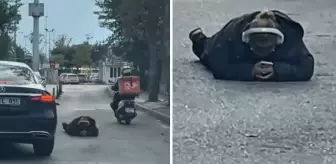 Dünya umurunda değil! Yolun ortasına uzanıp yaptığına bakın