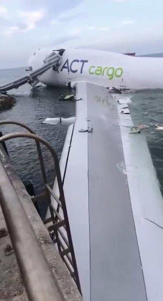 The cargo plane that lost control during landing in Hong Kong was dragged into the sea