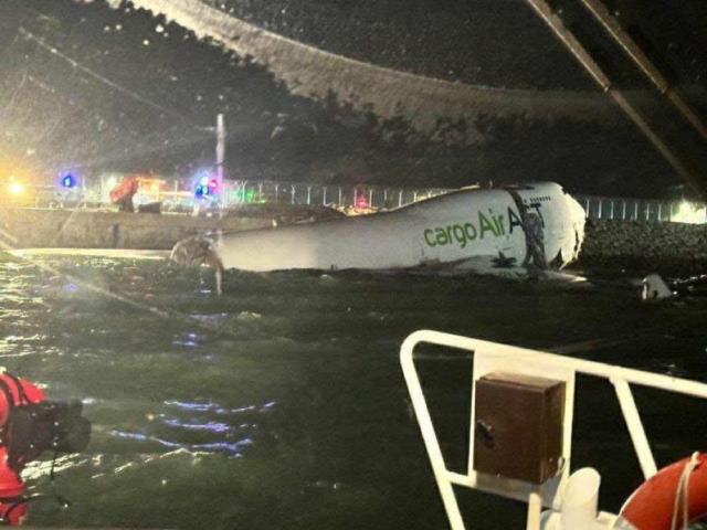 The cargo plane that lost control during landing in Hong Kong was dragged into the sea