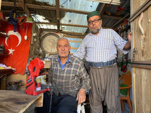 The bad neighbor made him both a tractor and a shop owner