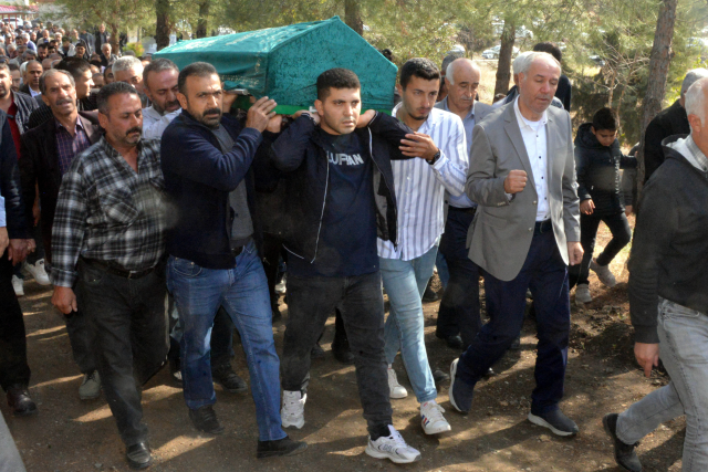 He carried the coffin of his mother, who was killed by his father