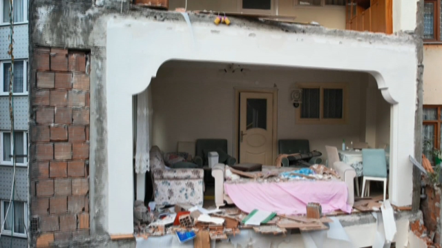 The 4-story building was demolished; the adjacent apartment was left without walls