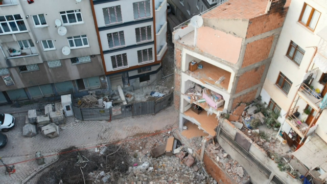 The 4-story building was demolished; the adjacent apartment was left without walls