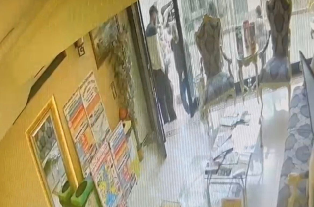 Moments captured on camera as the person performing the fumigation entered the hotel during the poisoning tragedy