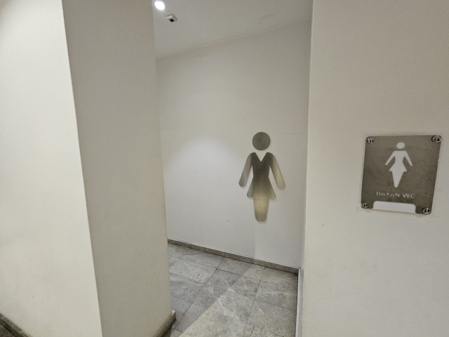 A mall employee experienced a nightmare in the women's restroom! From under the stall...