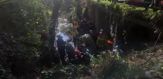 Bursa'da devrilen traktörün altında sıkışan sürücüyü ekipler kurtardı