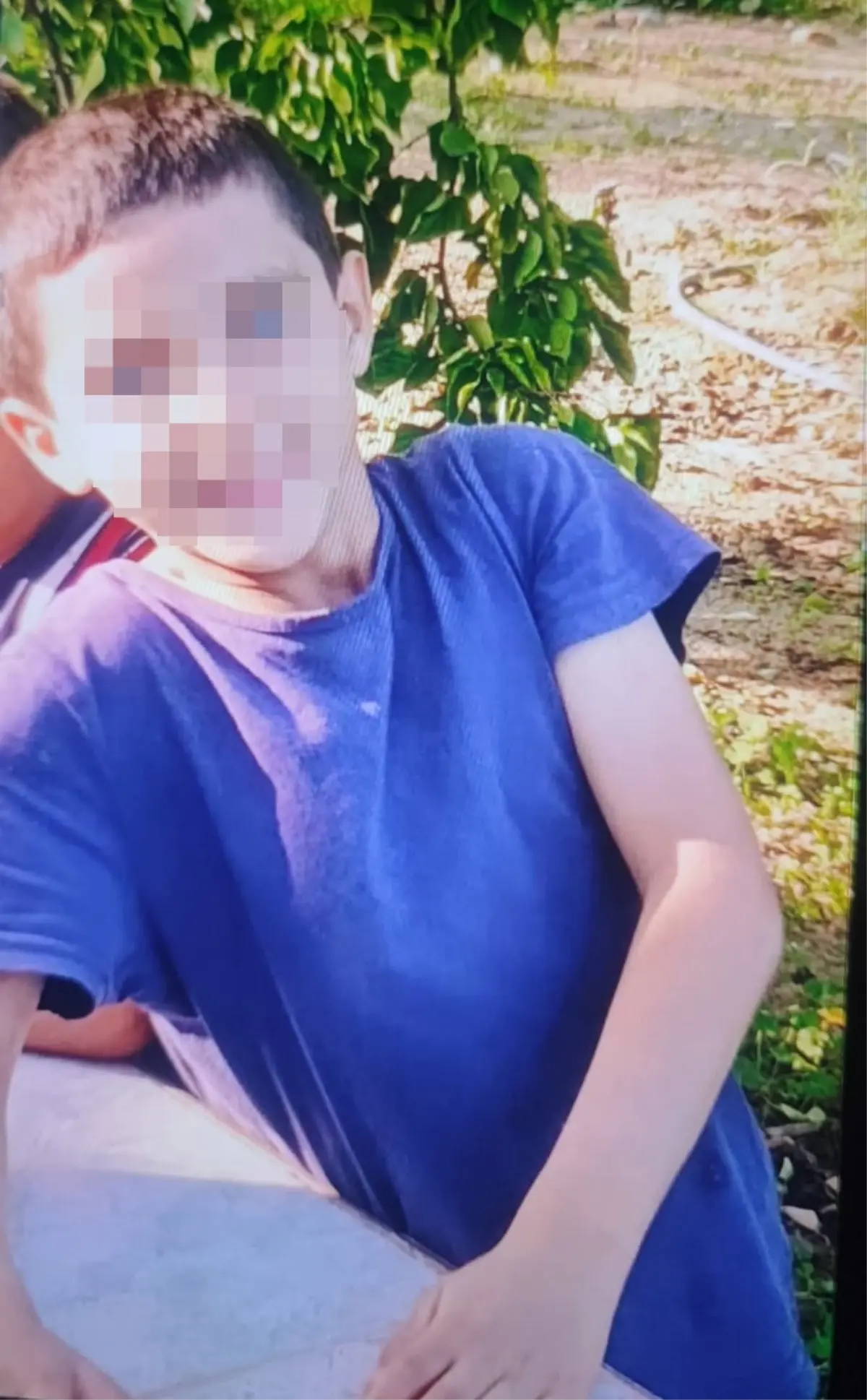 Vücudunun bir kısmı toprağa gömülü bulunan Amir'in dayısı suçlamaları reddetti