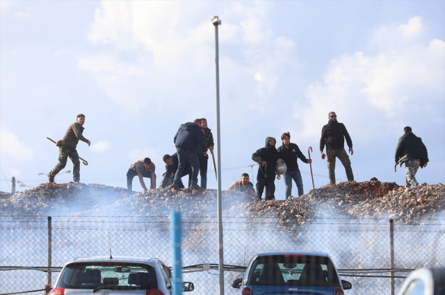 Farmers stormed the airport in Greece's Crete Island and clashed with police