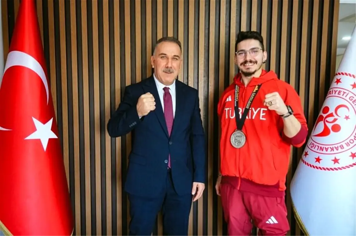 Müdür Yığmatepe, dünya ikincisi milli sporcuyu ağırladı