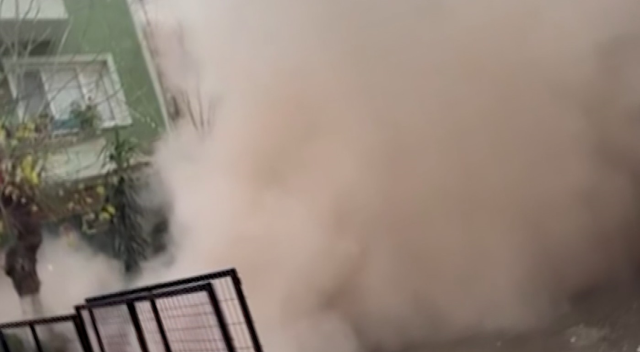 The top floor of the demolished 4-story building remained standing