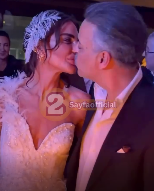 A striking moment at Süreyya Yalçın's birthday! Her husband kissed her on the lips