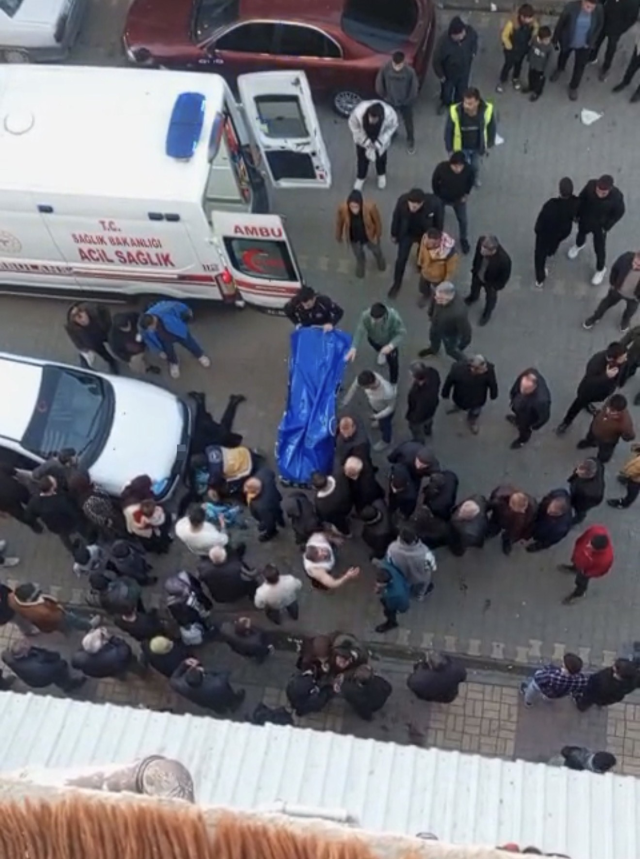 He stabbed his wife to death in the middle of the street