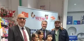 TDV'den Gürcistan'da 650 yetime giyim yardımı