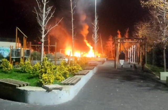 They lit a fire to keep warm, turning the children's park to ashes