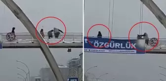 Üst geçitte kar topu atan çocukları yumruklayıp, yerde tekmeledi