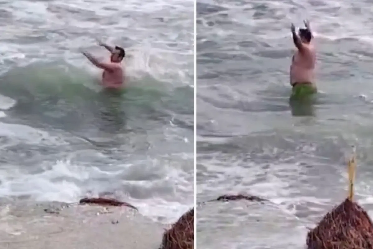 Silivri'de bir vatandaş soğuk hava ve lodosa aldırış etmeden denize girdi